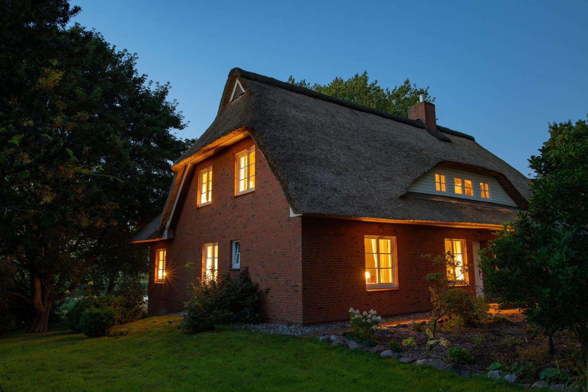 Villa Reetdachhaus Eiderblick à Breiholz Extérieur photo