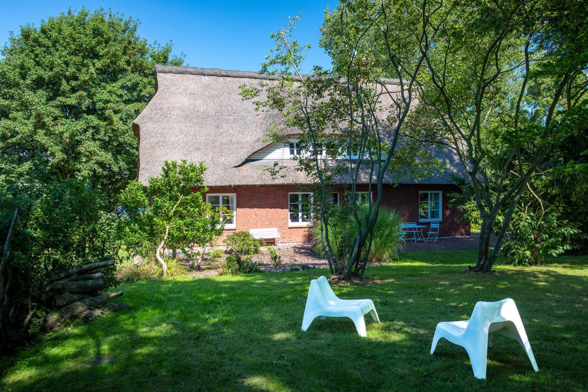 Villa Reetdachhaus Eiderblick à Breiholz Extérieur photo